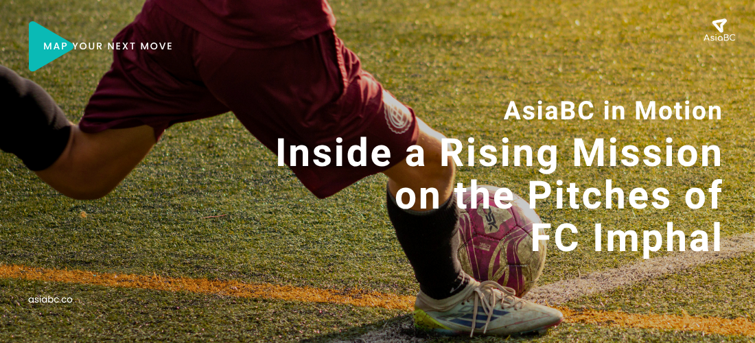 Photo of a boot kicking a ball, showcasing next-gen talent in grassroots football community, presented by Asia Business Centre | AsiaBC