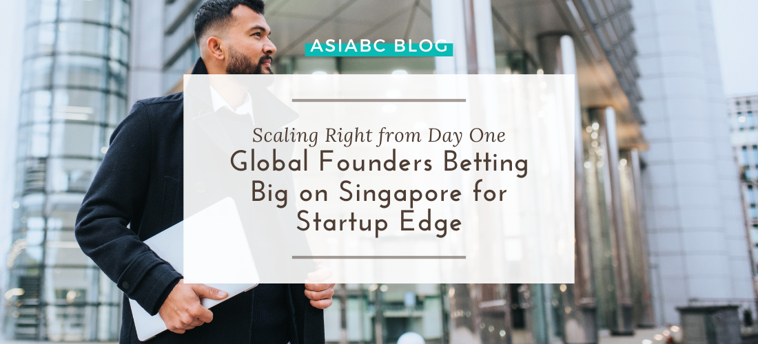 Blog Banner - Scaling Right from Day One HK Founders Betting Big on Singapore for Startup Edge Entrepreneur with laptop outside modern glass building, symbolising expansion opportunities with Singapore company setup.